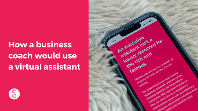 A smartphone displaying a pink text block about executive assistants, set against a soft-focus background with the text 'How a business coach would use a virtual assistant' on the left