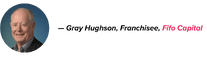 Gray Hughson, Franchisee of Fifo Capital, smiling in a dark suit against a gradient blue background, with his name in black and company name in pink