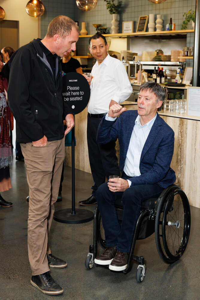 Adam Findlay (Left) talking with Craig Vincent (PGL Group)
