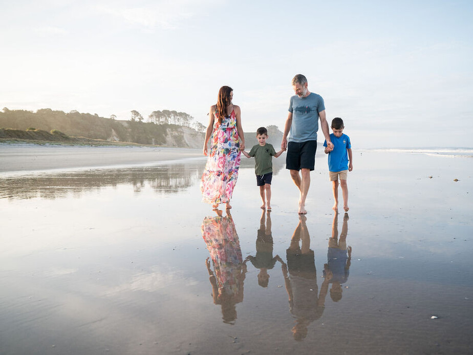 Family on beach.  Reflection beach shoot.  Tauranga Photographer.  Tauranga Family Photographer.  Papamoa Family Photographer.  Family.  Bay of Plenty Photographer.
