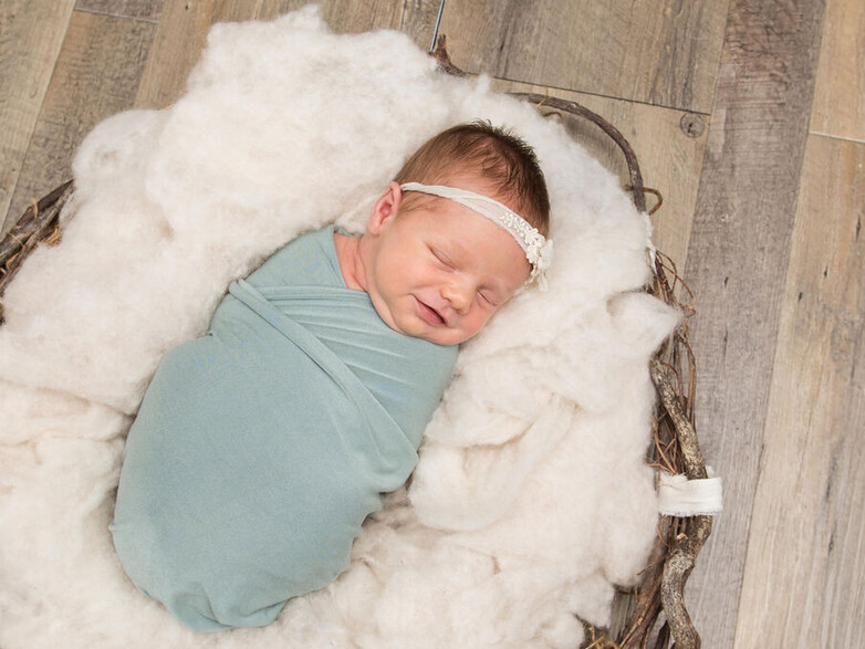 Newborn baby smiles.  Baby photography.  Papamoa Photographer.  Newborn Photographer.  Tauranga Photographer.  Newborn photoshoot.  Baby photoshoot.