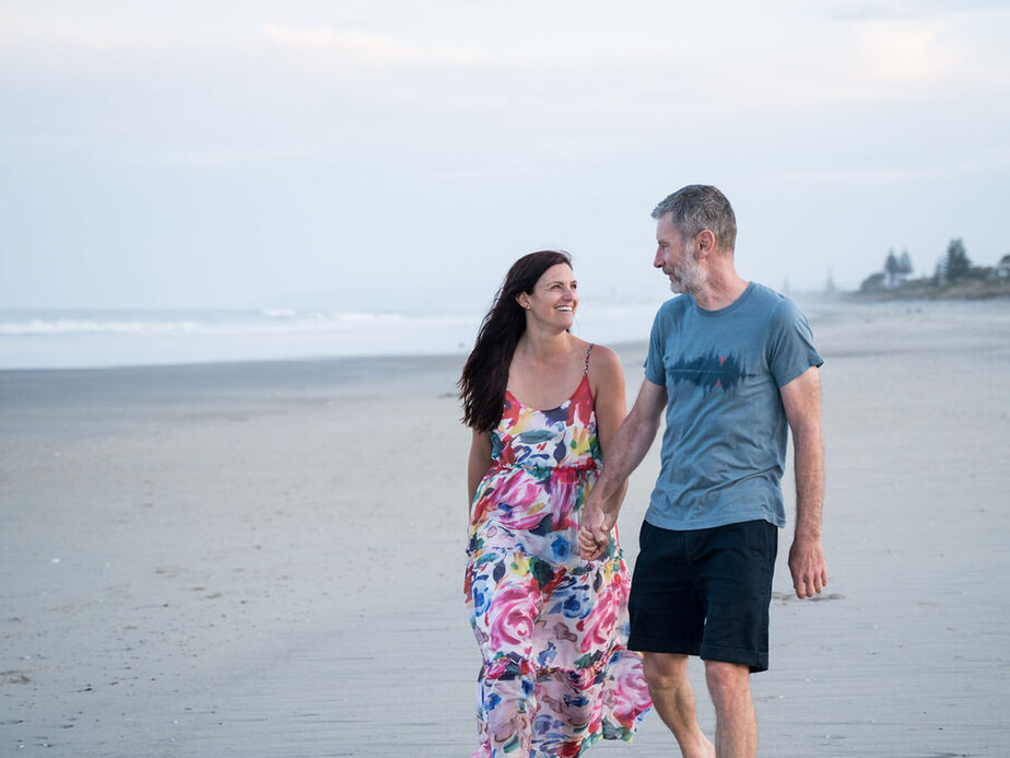 Couple walking on beach.  Couple photoshoot.  Tauranga Photographer.  Tauranga Family Photographer.  Papamoa Family Photographer.  Family.  Bay of Plenty Photographer.