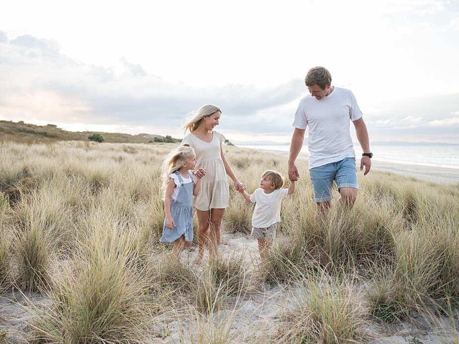 Tauranga Photographer.  Family on the beach in the sand dunes.  Jackie O'Photography.  Papamoa Family Photographer.