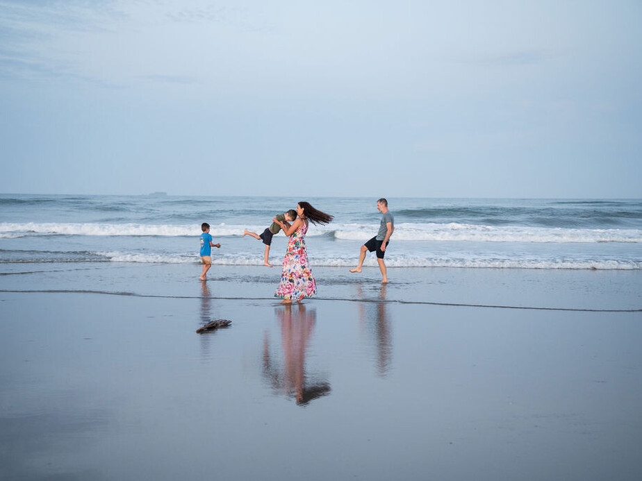 Family fun on beach.  Reflection shot.  Tauranga Photographer.  Tauranga Family Photographer.  Papamoa Family Photographer.  Family.  Bay of Plenty Photographer.