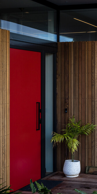 Red door of Hamilton Lake house