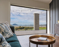 fair face concrete pillar and pool house view to mount maunganui