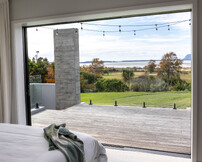 fair face concrete pillar and pool house view to mount maunganui