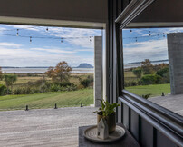 fair face concrete pillar and pool house view to mount maunganui