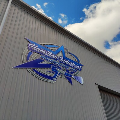 Photo of Hamilton Industrial Powdercoating's logo on their building at 12 Belfast Place, Frankton Hamilton
