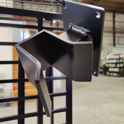 Photo of an automatic gate latch powder coated in gloss back by Hamilton Industrial Powder Coating