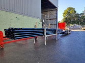 Photo of 12 out of 20 black powder coated skip bins