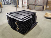 Photo of 12 out of 20 black powder coated skip bins