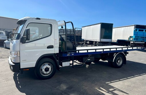 Photo of fuso canter salvage truck - passenger side view