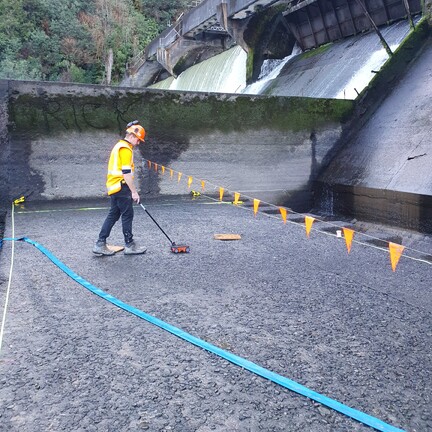 Scientist conducting concrete scanning investigations