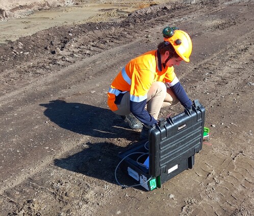 Scientist using Vibration and Sound Monitoring equipment