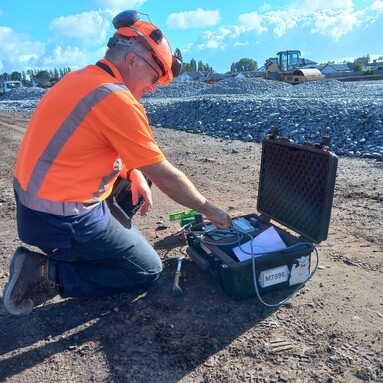 Scientist using Vibration Monitoring equipment