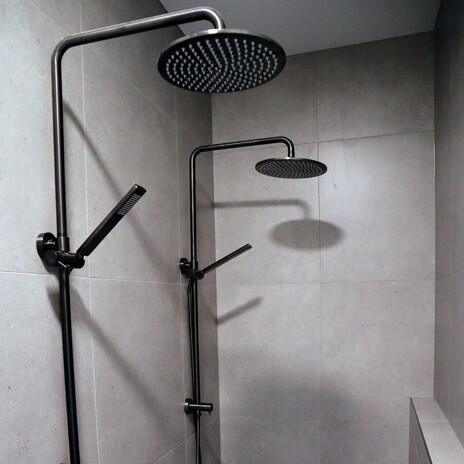 Image of modern tiled walk in shower. Tiling service by Cosmic Tiling. Waikato.