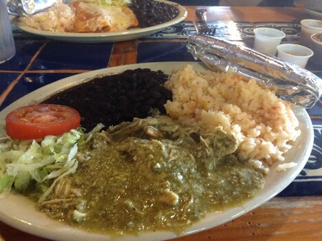 On further inspection, this isn't enchiladas...but the plate of food in the background is. Now I'm just making myself hungry...