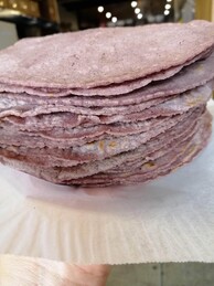 a stack of our own corn tortillas, made from imported masa harina