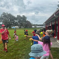 School Holiday programme - image of kids playing outside