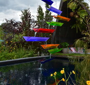 Ben Hoyle Design - ''ADIDIG - All Day I Dream In Gardens". A colourful floating rill cascades from above in this garden of memories.
