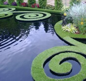 Ben Hoyle Design - "A French Kiss in Akaroa". Floating rata vine captures floating gardens in this Kiwi meets French inspired globally renowned garden.