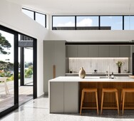 Kitchen and dining area with raking windows & highlight glazing, Raglan build