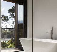 designer bathroom with Raglan estuary view &ndash; Nixon Homes
