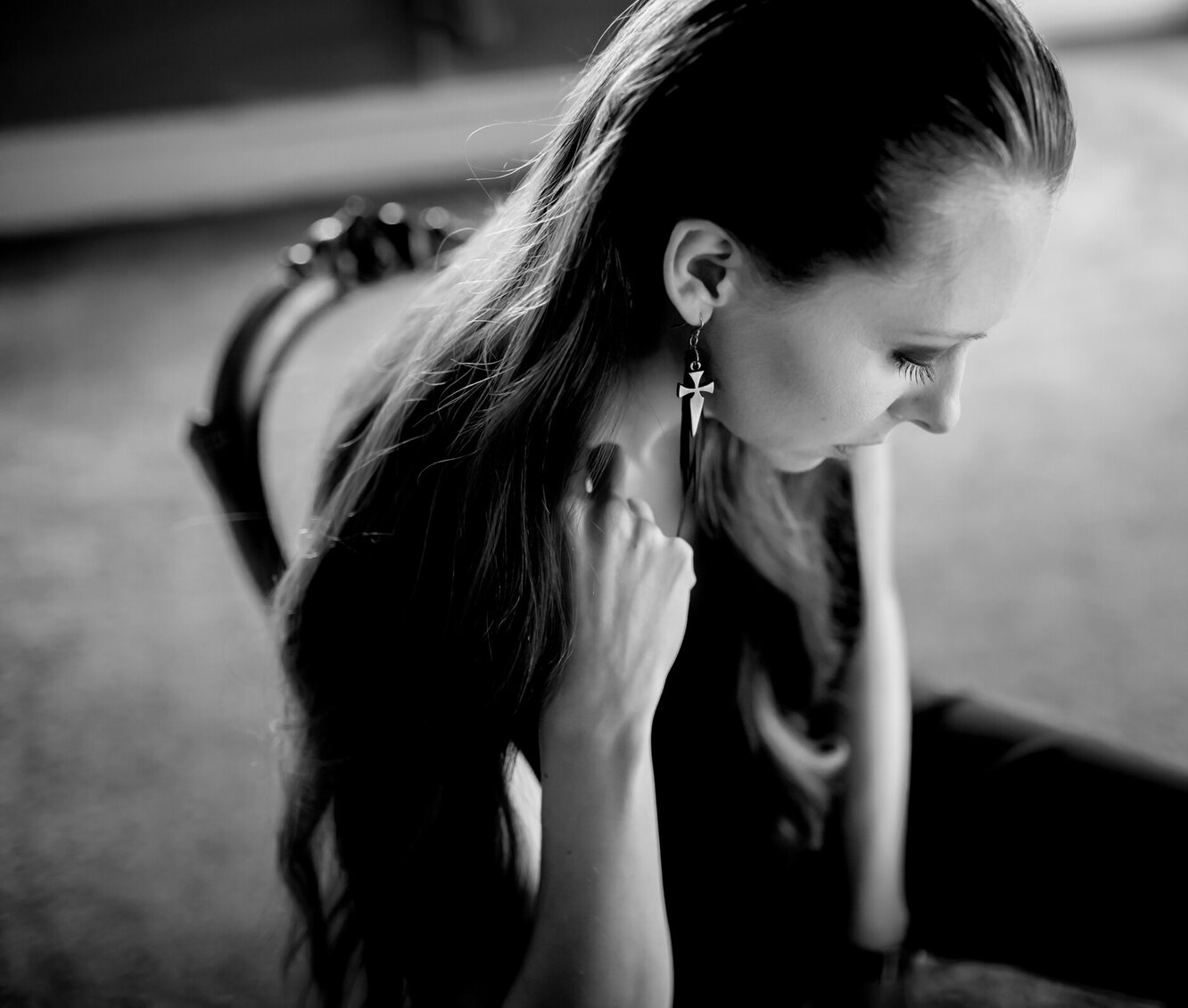 An image of a model wearing Jane Sutherland's dagger earrings.