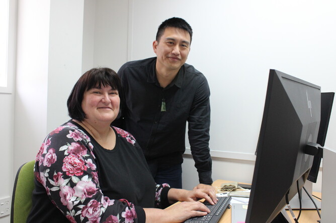 Enrich Group chief executive Karen Scott, left, with Management Services general manager Johnathan Tan.