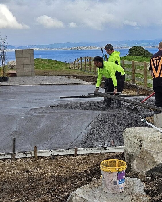 Stylish driveway for a residential property in Rotorua with a view on the lake