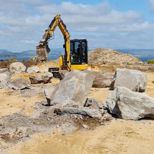 Natural boulder retaining wall built by Ultrascape in Rotorua