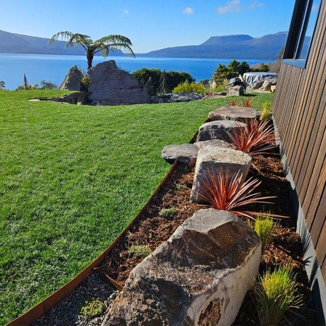 large boulders in a natural rock garden in a home in Rotorua