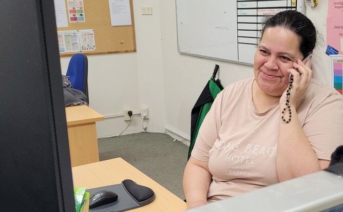 Trish as she is often seen on the phone answering questions and providing wise advice with a smile.