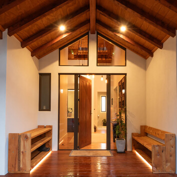 High pitched raked ceiling entranceway