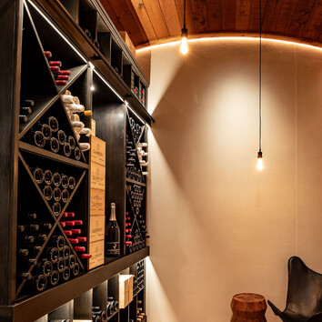 wine cellar with curved timber ceiling.