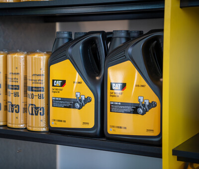 Cat Oils and Filters on a shelf for sale