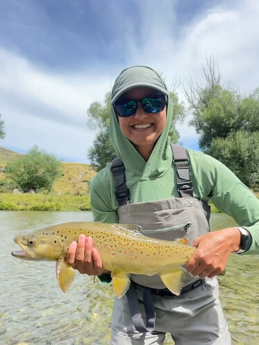 Jocelyn with a willow grubbing brown trout