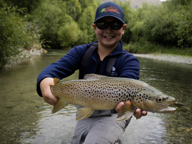 kid catches big brown on flyrod First fish on a flyrod for Zachary Todd Adolph 