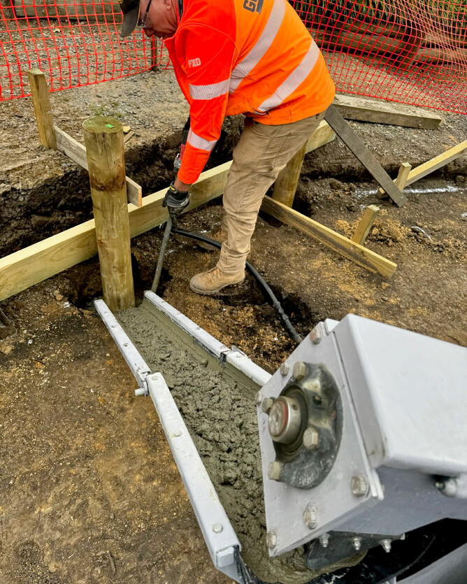 Crewmix volumetric concrete plant pours retaining post concrete