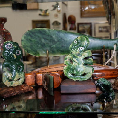 a collection of Maori Pounamu (Jade) pendants and jewellery at Rotorua Antiques & Collectables