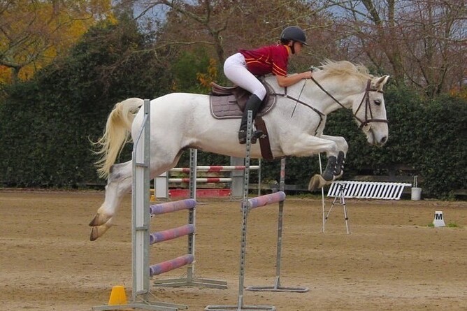 Brooke competing on one of her horses.