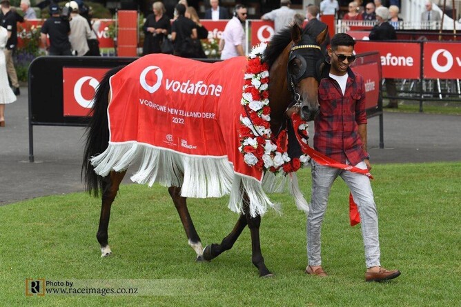 Jaffer leading back Group One NZ Derby winner, Asterix. - Photo captured by Race Images.