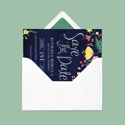 Wedding invitation in an envelop featuring floral design