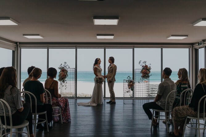 A wedding in Mt Maunganui Lifeguard Service's function room - by Turama Photography