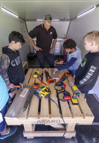 Stu Thompson and students inside the ICONZ Workshop