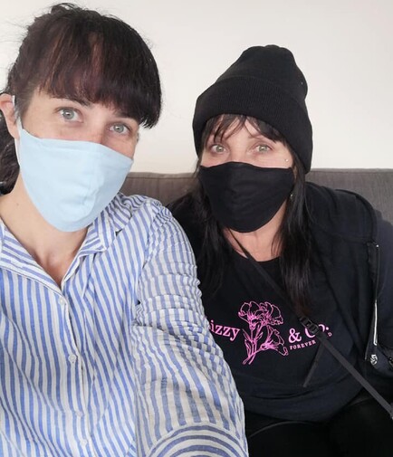 Two Awhina House staff wearing face masks