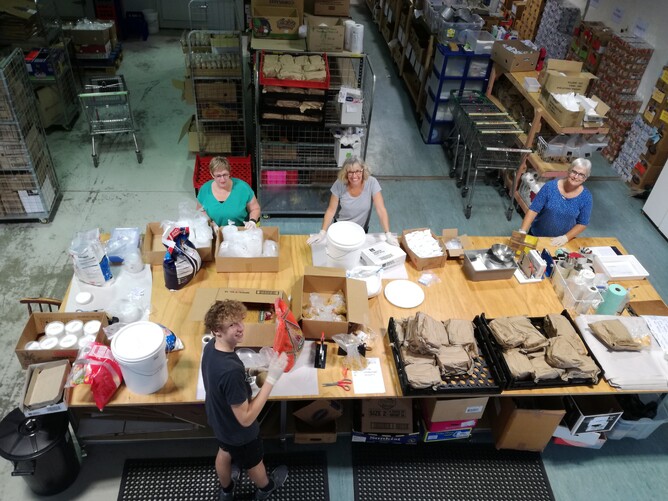 Tauranga Foodbank volunteers packing food