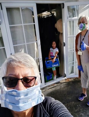 Nga Kakano staff deliver groceries to family