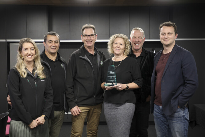 Good Neighbour team pose with their award